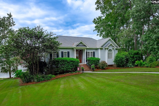 single story home with a front yard