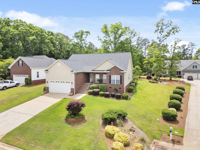 ranch-style house with brick siding, driveway, and a front yard