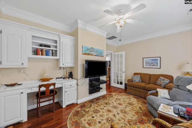 living room featuring visible vents, ornamental molding, built in study area, and dark wood-type flooring