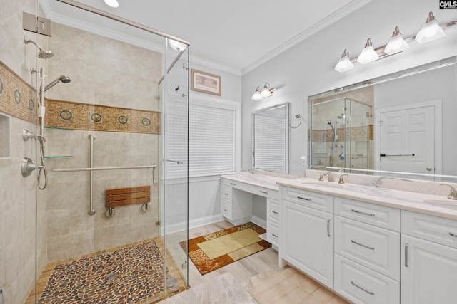 bathroom with double vanity, ornamental molding, a sink, and a stall shower