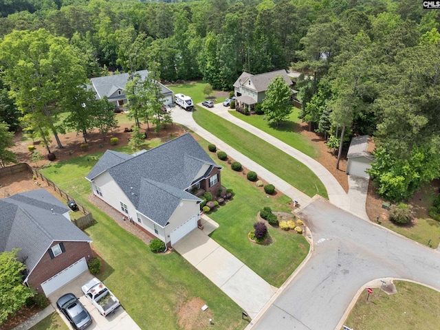 drone / aerial view with a view of trees