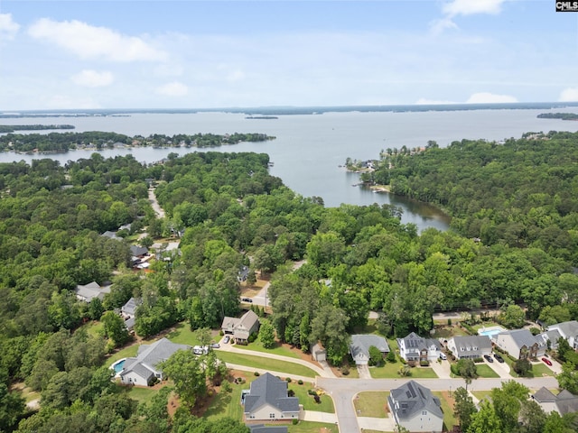 birds eye view of property with a residential view, a water view, and a forest view