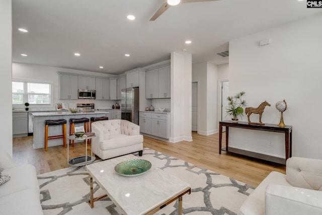12 Magnolia Bay Ct, Columbia, SC 29229 - living area featuring light wood-style flooring, a ceiling fan, and recessed lighting
