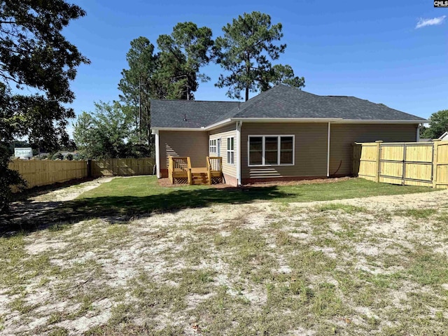 12 Magnolia Bay Ct, Columbia, SC 29229 - back of property with a wooden deck and a shingled roof