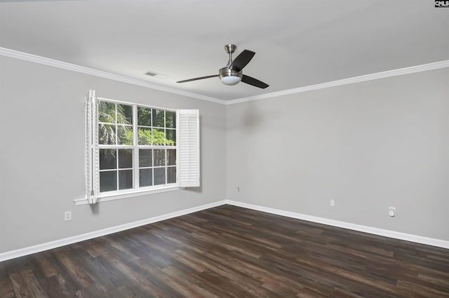 empty room with ceiling fan, baseboards, ornamental molding, and wood finished floors