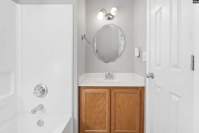 bathroom featuring vanity and shower / washtub combination