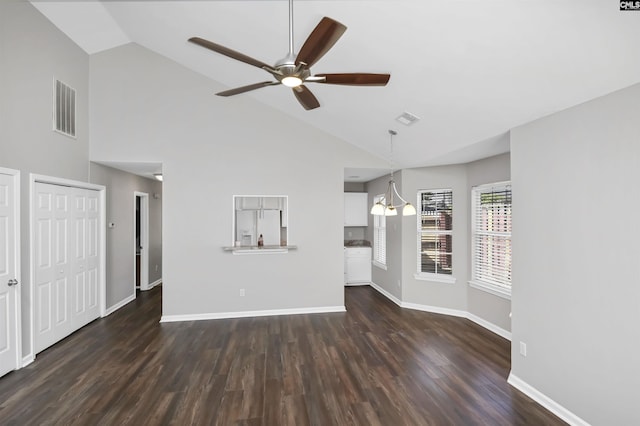unfurnished living room with high vaulted ceiling, ceiling fan, dark wood-style flooring, and visible vents