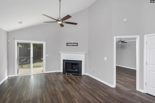 unfurnished living room with a ceiling fan, a fireplace with flush hearth, baseboards, lofted ceiling, and dark wood-type flooring