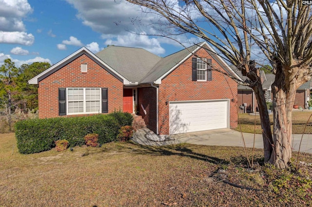 view of front of home featuring a garage, concrete driveway, a front lawn, and brick siding