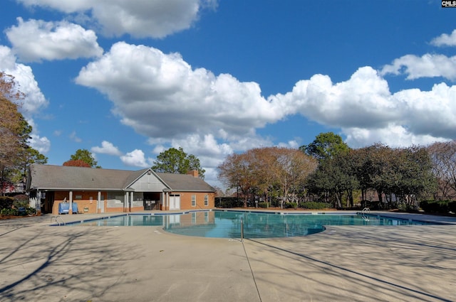 pool with a patio area