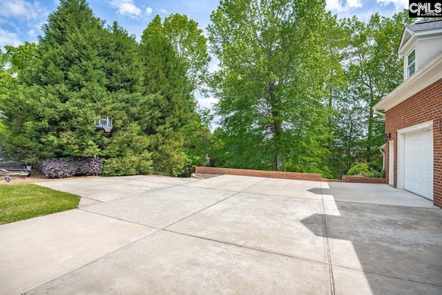 119 Ashley Trace Dr, Lexington, SC 29072 - view of patio / terrace with concrete driveway and a garage