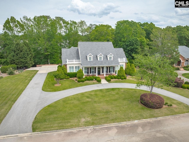 119 Ashley Trace Dr, Lexington, SC 29072 - new england style home with curved driveway, covered porch, and a front yard