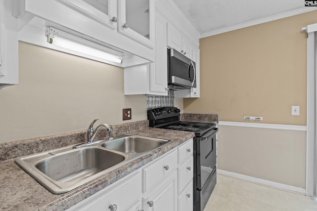 kitchen with a sink, white cabinetry, stainless steel microwave, light floors, and black range with electric stovetop