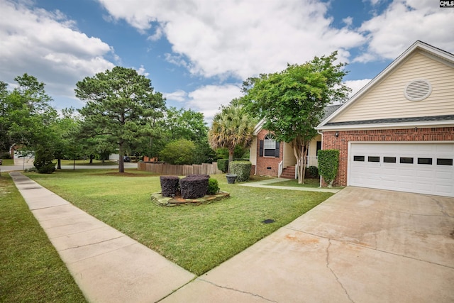 view of front of house featuring brick siding, driveway, fence, and a front yard