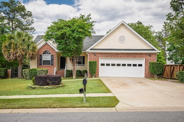 view of front of house with concrete driveway, a front lawn, and brick siding