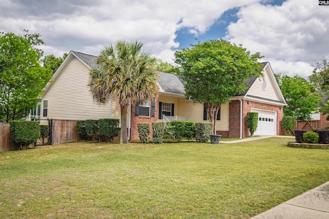view of front of house featuring a porch, a garage, brick siding, fence, and a front lawn