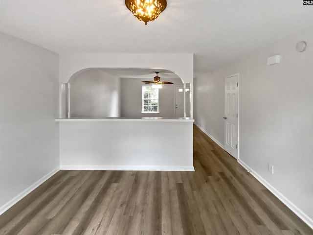 6 Sawdust Ct, Columbia, SC 29209 - spare room featuring baseboards, a ceiling fan, arched walkways, and wood finished floors