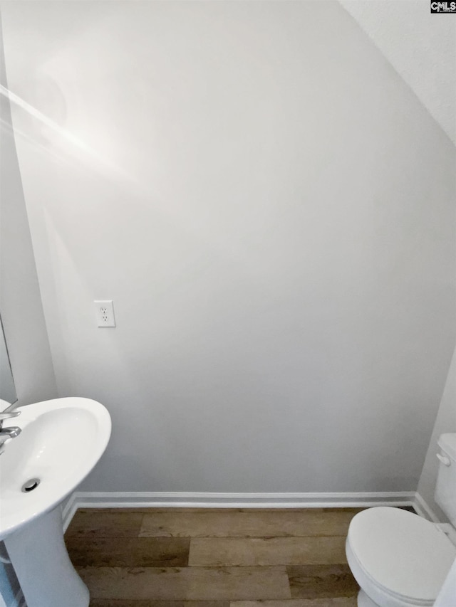 6 Sawdust Ct, Columbia, SC 29209 - bathroom featuring baseboards, wood finished floors, and toilet