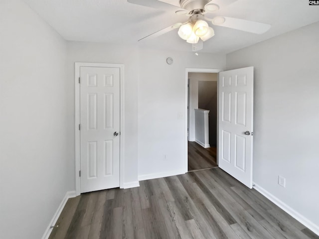 6 Sawdust Ct, Columbia, SC 29209 - unfurnished bedroom featuring baseboards, a ceiling fan, and wood finished floors