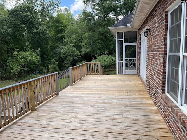 deck featuring a sunroom