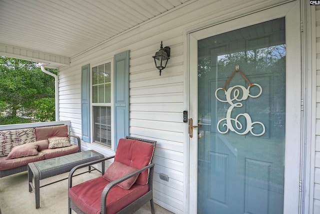 property entrance with a porch
