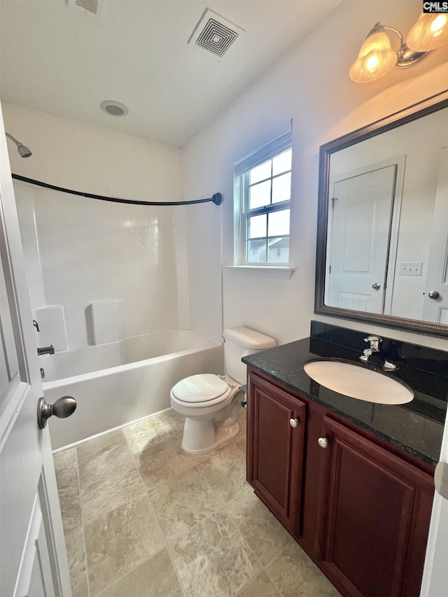 bathroom featuring visible vents, shower / washtub combination, toilet, and vanity