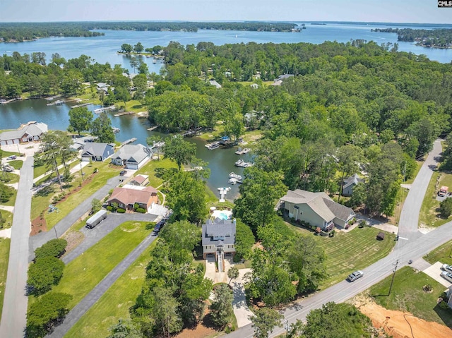 bird's eye view with a residential view and a water view