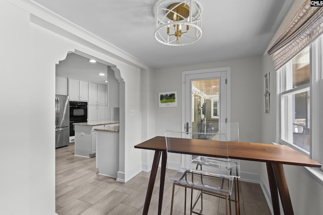 5904 Lakeshore Dr, Columbia, SC 29206 - dining space featuring recessed lighting, baseboards, a notable chandelier, and light wood-type flooring