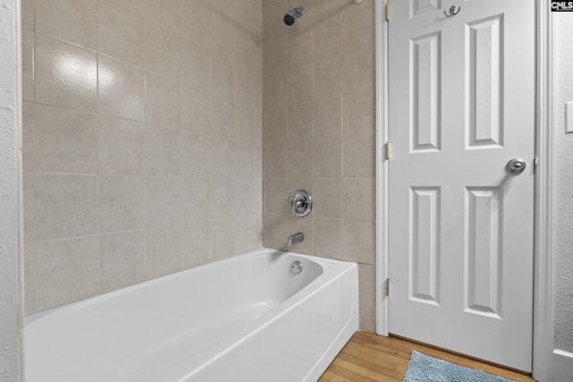 5904 Lakeshore Dr, Columbia, SC 29206 - full bath featuring wood finished floors and bathtub / shower combination