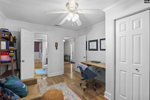 5904 Lakeshore Dr, Columbia, SC 29206 - office area featuring a ceiling fan, visible vents, crown molding, wood finished floors, and baseboards