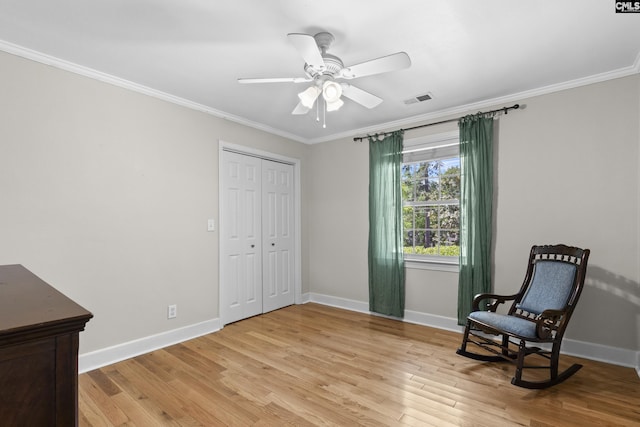 5904 Lakeshore Dr, Columbia, SC 29206 - living area featuring crown molding, ceiling fan, light wood-style floors, and visible vents