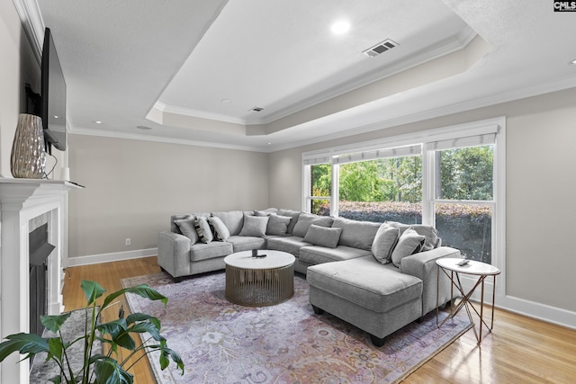 5904 Lakeshore Dr, Columbia, SC 29206 - living room with visible vents, baseboards, wood finished floors, and a tray ceiling