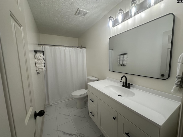 full bathroom with vanity, toilet, a textured ceiling, marble finish floor, and visible vents