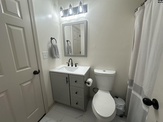 bathroom featuring vanity, baseboards, toilet, and curtained shower