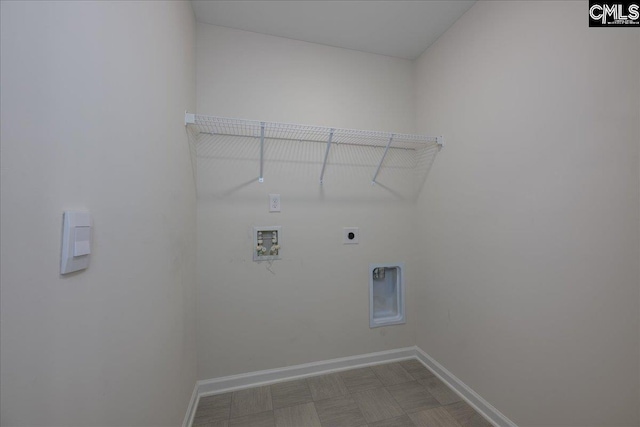 laundry room featuring laundry area, electric dryer hookup, baseboards, and hookup for a washing machine