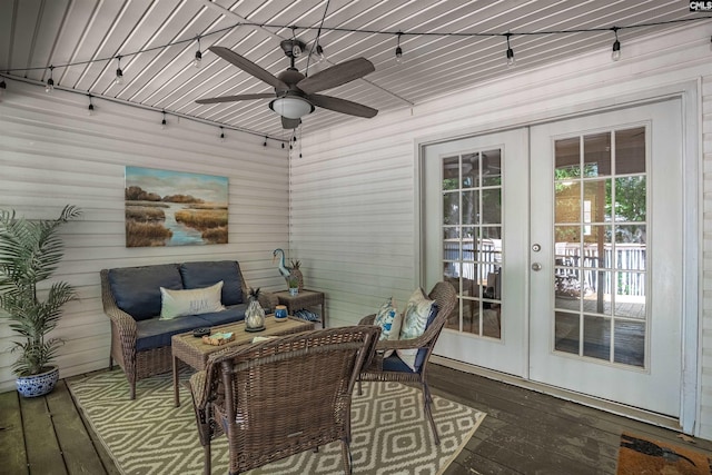 sunroom with ceiling fan, track lighting, and french doors