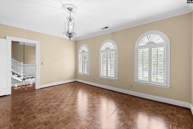 unfurnished room with baseboards, ornamental molding, a chandelier, and visible vents
