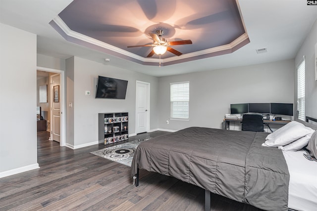 742 Westfield Rd, Lexington, SC 29073 - bedroom featuring crown molding, multiple windows, a tray ceiling, and wood finished floors