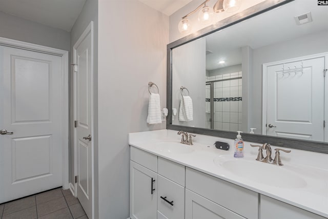742 Westfield Rd, Lexington, SC 29073 - bathroom with visible vents, a sink, tile patterned flooring, and a shower stall