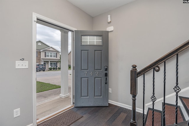 742 Westfield Rd, Lexington, SC 29073 - entryway with dark wood-type flooring, stairs, baseboards, and decorative columns