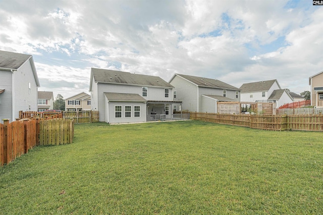 742 Westfield Rd, Lexington, SC 29073 - back of property with a lawn, a fenced backyard, a patio area, and a residential view