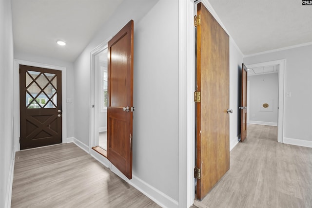 entryway featuring light wood-style floors and baseboards