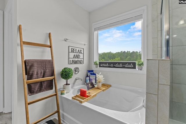 full bathroom with a bath