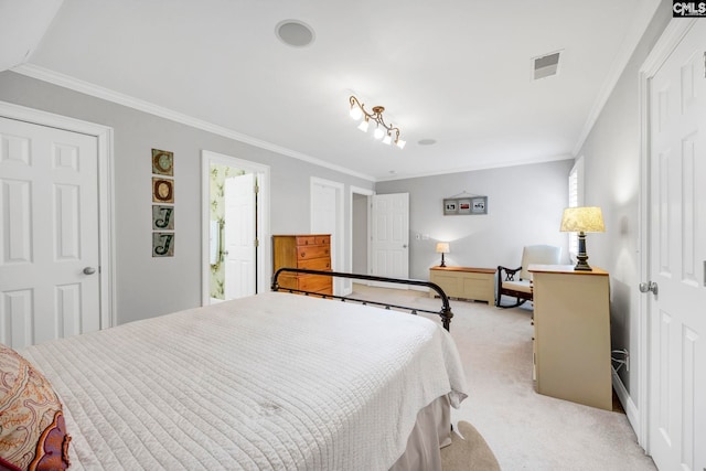 bedroom with crown molding, visible vents, multiple windows, and light colored carpet