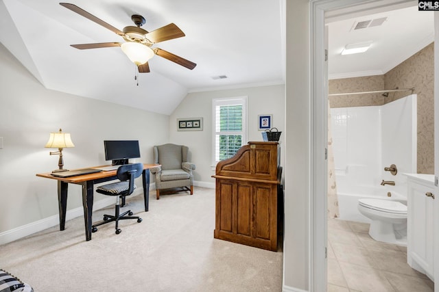 office with a ceiling fan, baseboards, lofted ceiling, visible vents, and ornamental molding