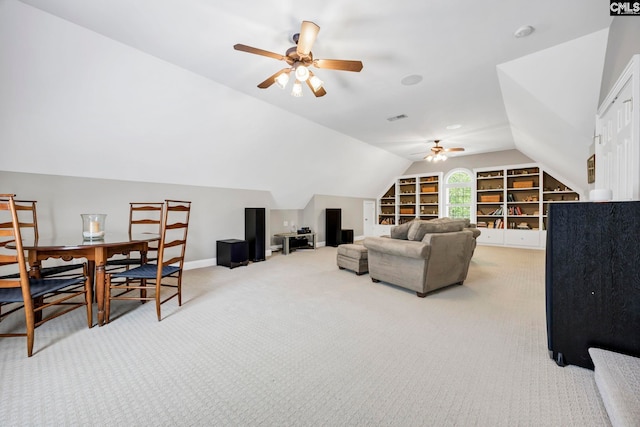 carpeted living area featuring ceiling fan, visible vents, built in features, baseboards, and lofted ceiling