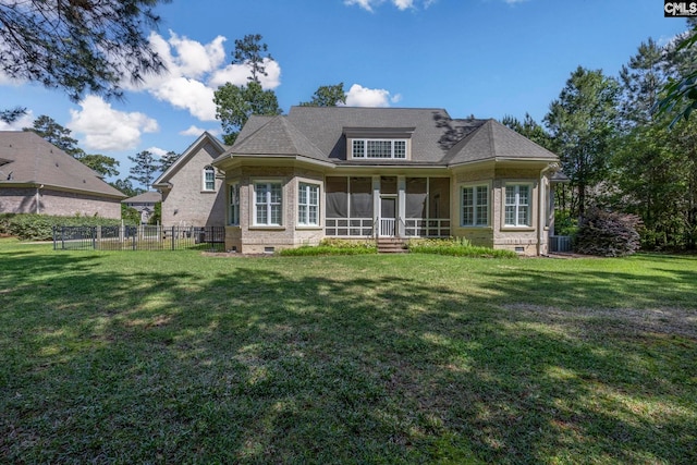 back of house featuring fence, central AC, a sunroom, crawl space, and a yard