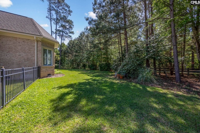view of yard featuring fence
