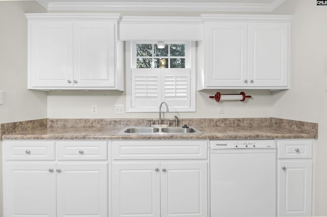 kitchen with crown molding, white dishwasher, a sink, and white cabinets