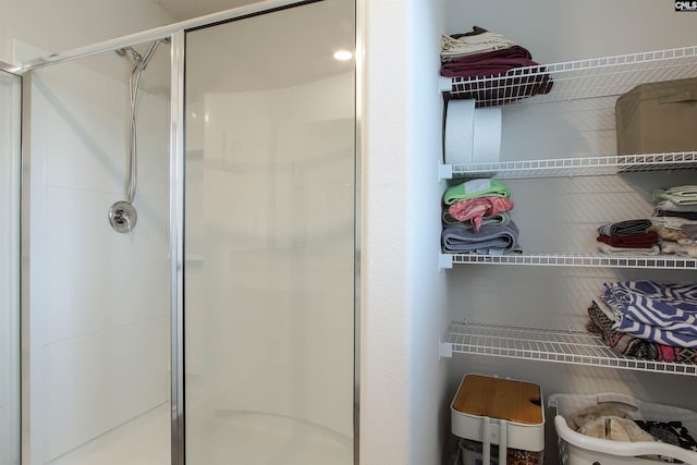 full bathroom featuring a stall shower